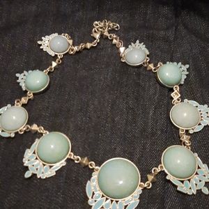 Heidi Klum gold tone and blue stone cor necklace